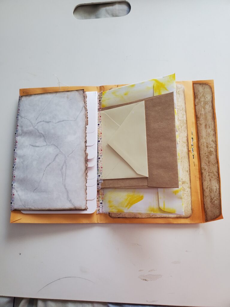 A journal made from odd sized envelopes